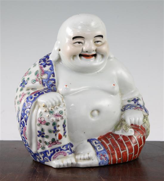 A Chinese famille rose seated figure Budai, Republic period, 20cm